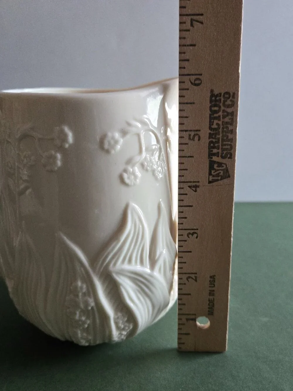 Pair of Ivory Bisque Pitchers